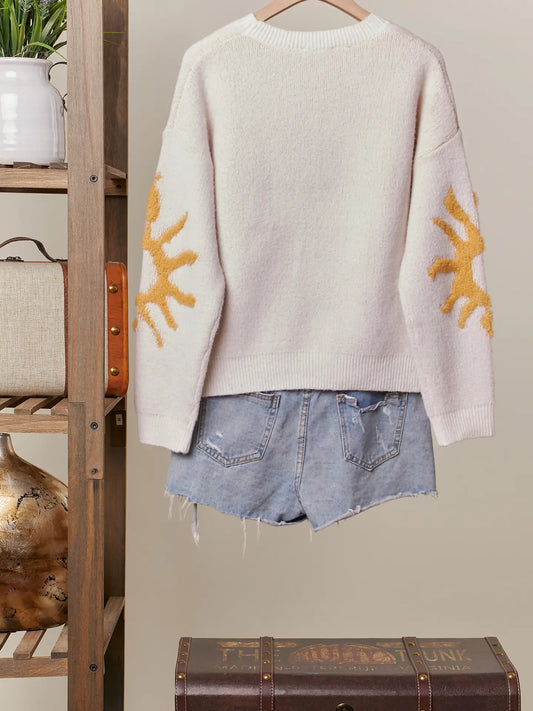 Knit Sweater with Sun design on sleeves and front